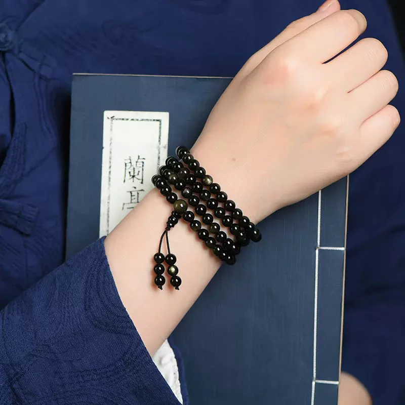 Braccialetto della ricchezza in ossidiana naturale con 108 perle di Mala Buddha Stones - Image 5