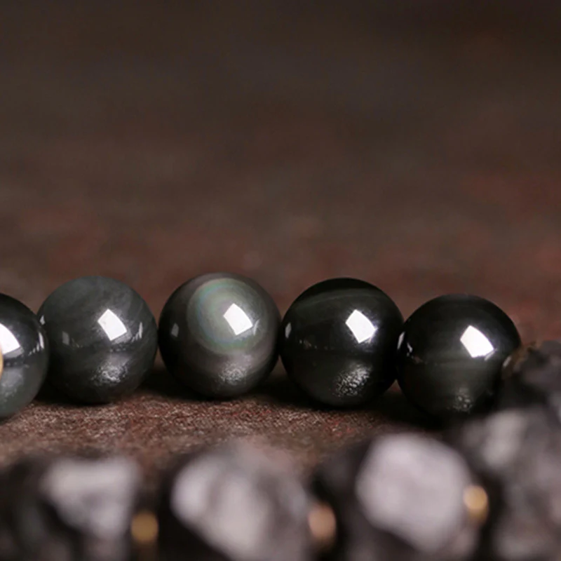 Braccialetto di coppia forza in rame, legno di ebano e ossidiana nera Buddha Stones - Image 8