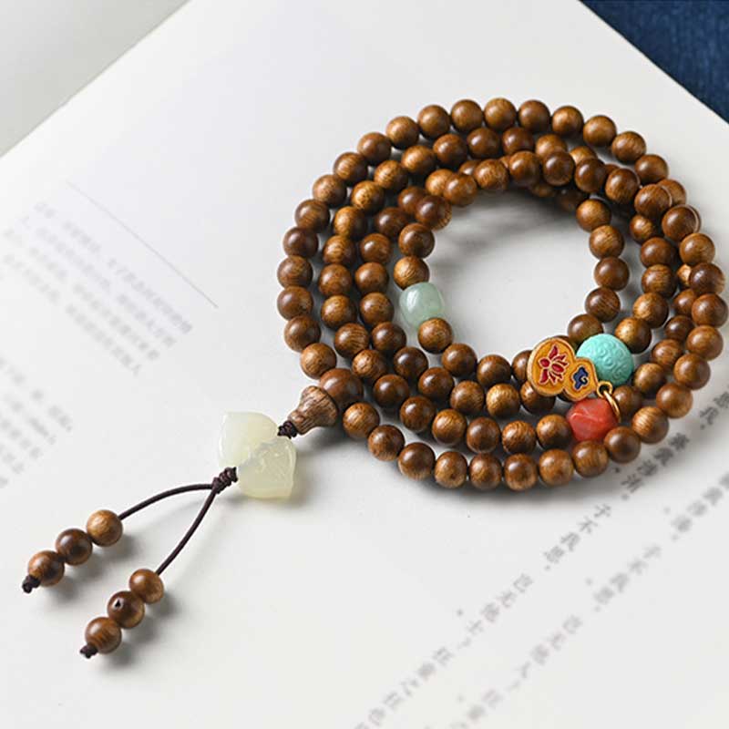 Braccialetto di protezione e calma in palissandro tibetano Buddha Stones Mala - Image 14